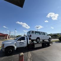 Tow truck transporting van